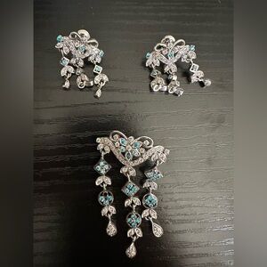 Silver and blue pendant and earrings